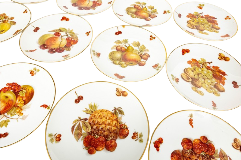 A collection of Debra by Bavaria salad plates featuring fruit designs